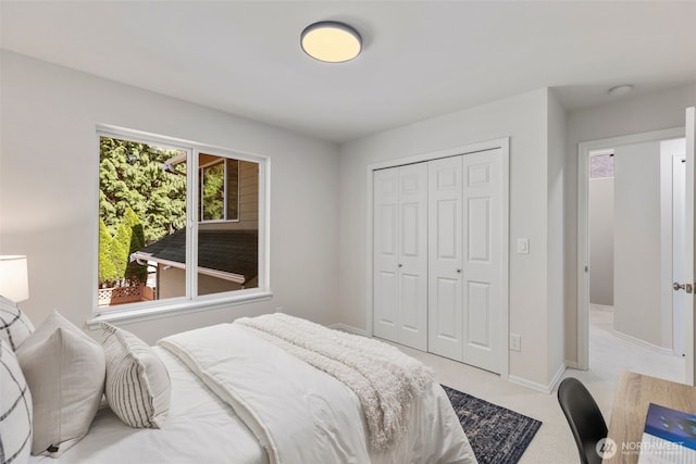 11734 167th Ct NE, Redmond, WA 98052 - bedroom featuring light colored carpet and a closet