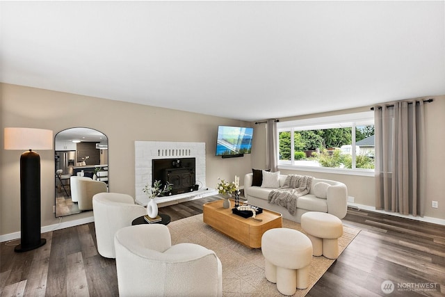 2422 179th Ave E, Lake Tapps, WA 98391 - living area featuring dark wood-style floors and baseboards