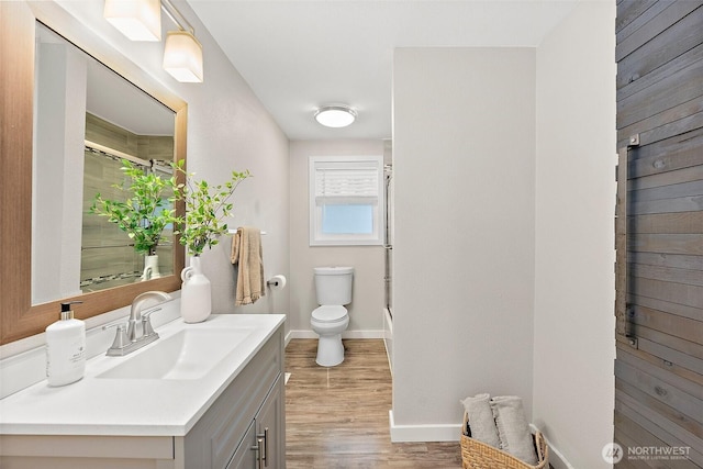 2422 179th Ave E, Lake Tapps, WA 98391 - bathroom with vanity, wood finished floors, and a shower with door