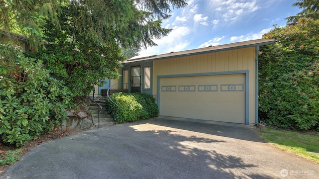 22230 100th Ave SE, Kent, WA 98031 - view of front of house featuring asphalt driveway and a garage