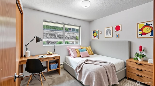 22230 100th Ave SE, Kent, WA 98031 - bedroom featuring a textured ceiling, an office area, and light carpet