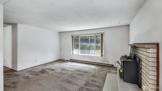 22230 100th Ave SE, Kent, WA 98031 - unfurnished living room featuring a baseboard heating unit, carpet flooring, and a textured ceiling