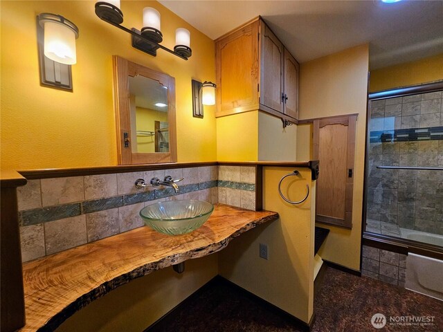 9813 36th St E, Edgewood, WA 98371 - bathroom with washtub / shower combination, tile patterned floors, and vanity