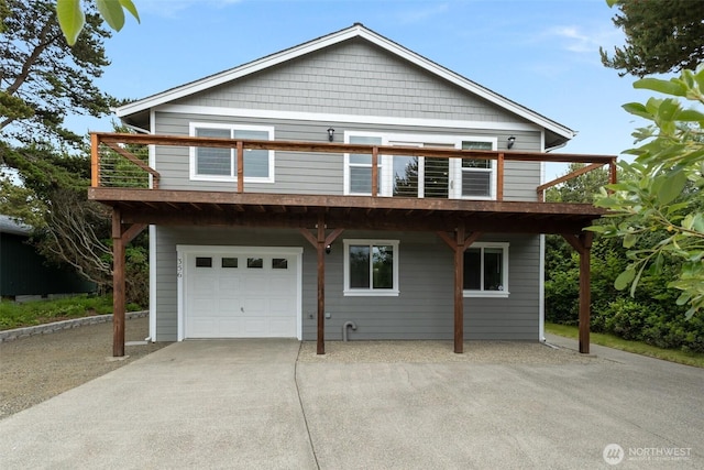 356 N Wynoochee Dr SW, Ocean Shores, WA 98569 - view of front of property featuring a garage and concrete driveway