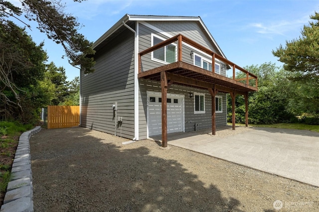 356 N Wynoochee Dr SW, Ocean Shores, WA 98569 - view of front of home with dirt driveway and an attached garage