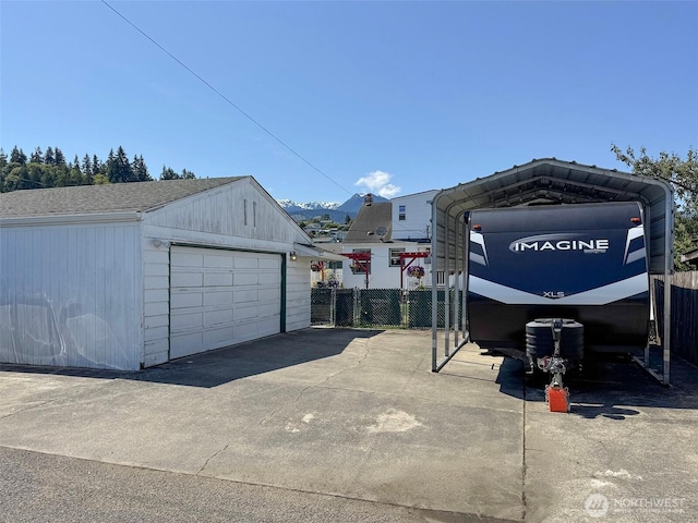 1011 E 5th St, Port Angeles, WA 98362 - detached garage with a carport and driveway