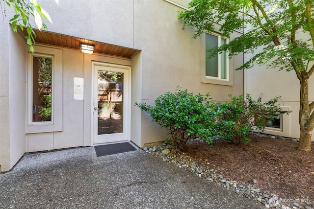 8503 Bowdoin Way Unit 203, Edmonds, WA 98026 - doorway to property with stucco siding