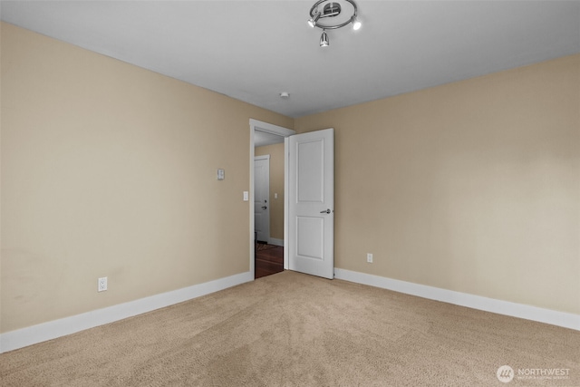 8503 Bowdoin Way Unit 203, Edmonds, WA 98026 - carpeted spare room with baseboards