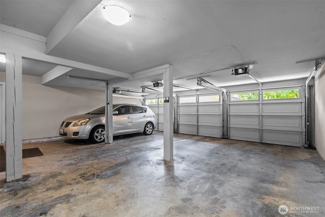 8503 Bowdoin Way Unit 203, Edmonds, WA 98026 - garage featuring a garage door opener