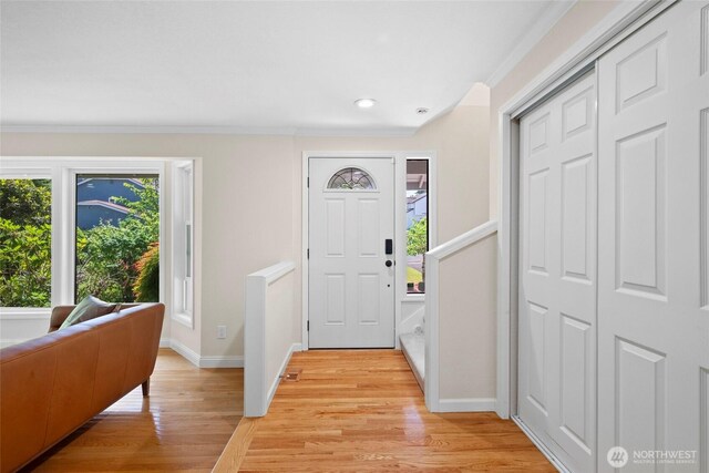 5610 S 296th Ct, Auburn, WA 98001 - entrance foyer featuring light wood-style floors, ornamental molding, and recessed lighting
