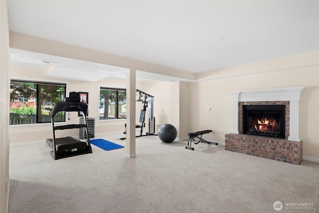 5610 S 296th Ct, Auburn, WA 98001 - workout area featuring carpet flooring and a fireplace
