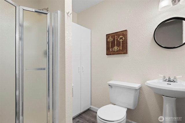 5610 S 296th Ct, Auburn, WA 98001 - full bath featuring a shower stall and wood finished floors