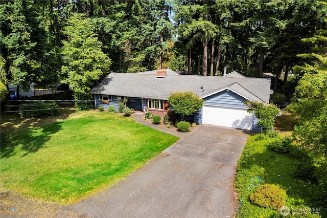 8415 57th Ave E, Puyallup, WA 98371 - ranch-style home with an attached garage and concrete driveway