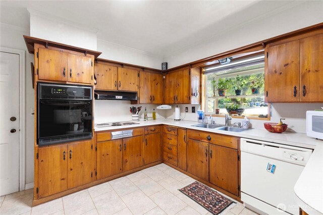 8415 57th Ave E, Puyallup, WA 98371 - kitchen with white appliances, under cabinet range hood, brown cabinets, light countertops, and ornamental molding