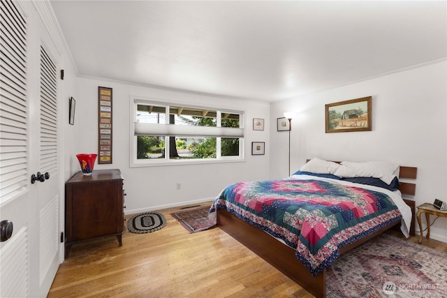 8415 57th Ave E, Puyallup, WA 98371 - bedroom with wood finished floors and crown molding