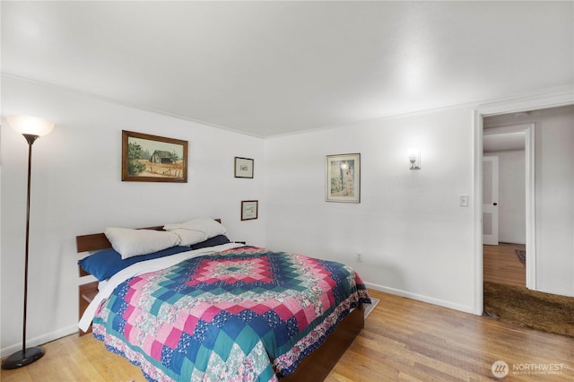 8415 57th Ave E, Puyallup, WA 98371 - bedroom featuring wood finished floors and baseboards