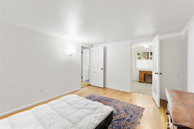 8415 57th Ave E, Puyallup, WA 98371 - bedroom featuring light wood-type flooring and crown molding