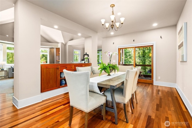 13730 Main St, Bellevue, WA 98005 - dining space featuring a chandelier, light wood finished floors, healthy amount of natural light, and recessed lighting