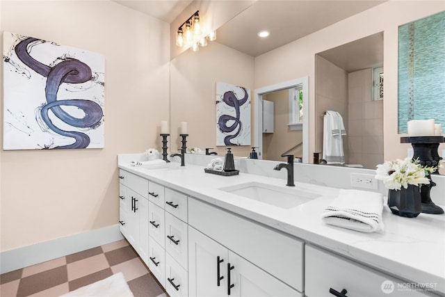 13730 Main St, Bellevue, WA 98005 - bathroom with double vanity, tile patterned floors, and recessed lighting