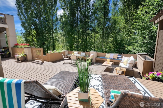 13730 Main St, Bellevue, WA 98005 - wooden deck with an outdoor living space