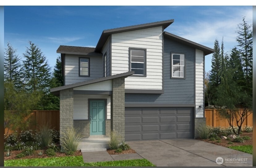 609 103rd Ct SE Unit 12, Lake Stevens, WA 98258 - contemporary home featuring a garage, driveway, and brick siding