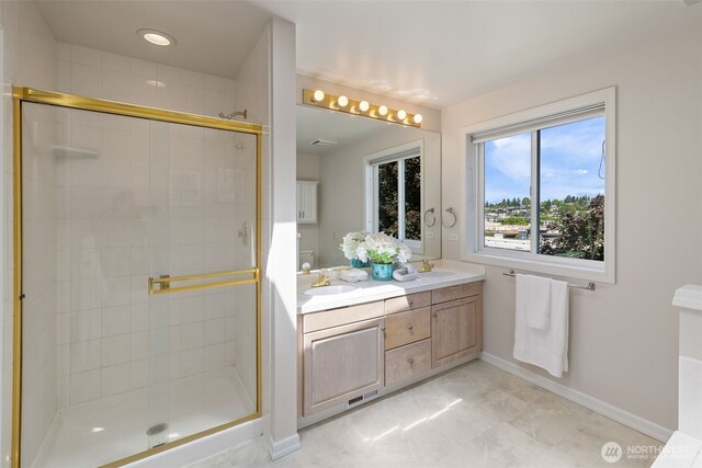 327 2nd Ave S, Kirkland, WA 98033 - bathroom featuring a shower stall and double vanity