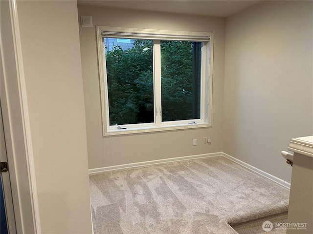 327 2nd Ave S, Kirkland, WA 98033 - spare room featuring carpet flooring and baseboards