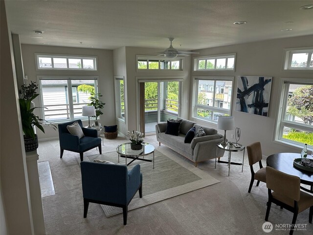 327 2nd Ave S, Kirkland, WA 98033 - living room with carpet floors and a ceiling fan