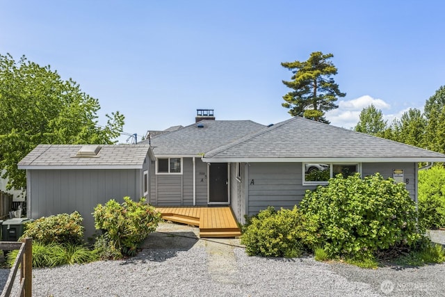 15330 40th Ave W Unit A & B, Lynnwood, WA 98087 - view of front of house with a wooden deck, roof with shingles, and a chimney