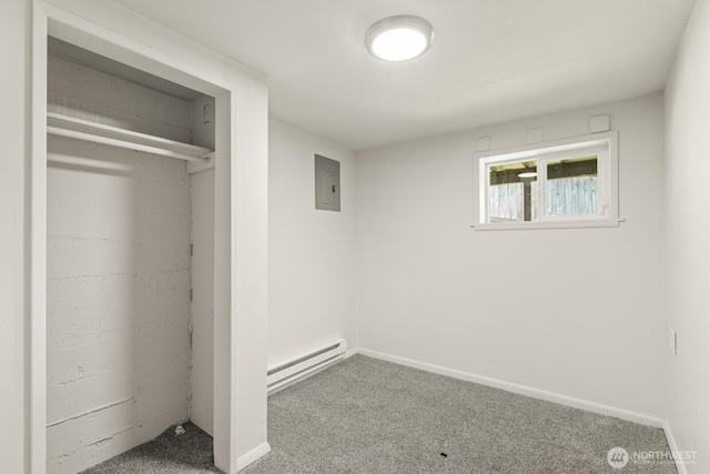 15330 40th Ave W Unit A & B, Lynnwood, WA 98087 - unfurnished bedroom featuring a baseboard heating unit, electric panel, carpet flooring, and baseboards