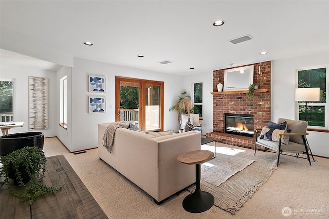 29247 188th Ave SE, Kent, WA 98042 - living area featuring light carpet, a fireplace, recessed lighting, and plenty of natural light