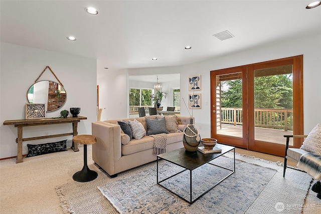 29247 188th Ave SE, Kent, WA 98042 - living room featuring recessed lighting, carpet flooring, a chandelier, and french doors