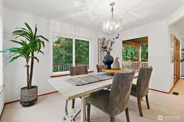 29247 188th Ave SE, Kent, WA 98042 - dining area with light carpet and a chandelier