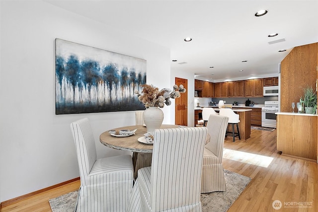 29247 188th Ave SE, Kent, WA 98042 - dining space with light wood-style flooring and recessed lighting