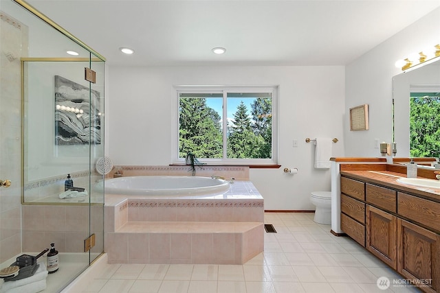 29247 188th Ave SE, Kent, WA 98042 - full bath featuring vanity, a bath, a shower stall, tile patterned floors, and recessed lighting