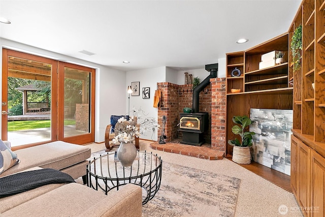 29247 188th Ave SE, Kent, WA 98042 - living area with a wood stove, recessed lighting, and wood finished floors