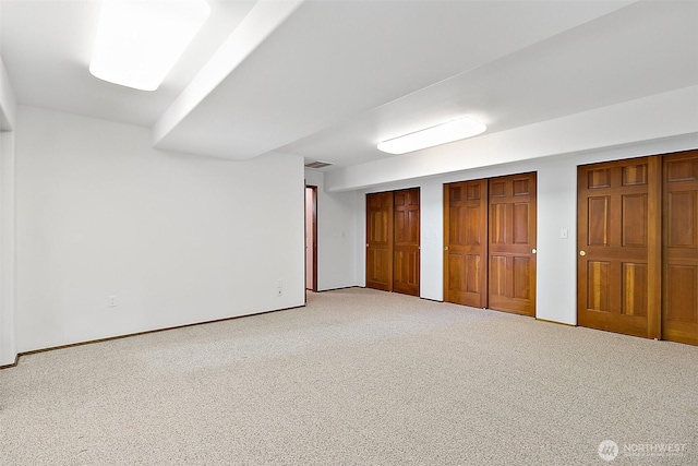 29247 188th Ave SE, Kent, WA 98042 - unfurnished bedroom featuring two closets and light carpet