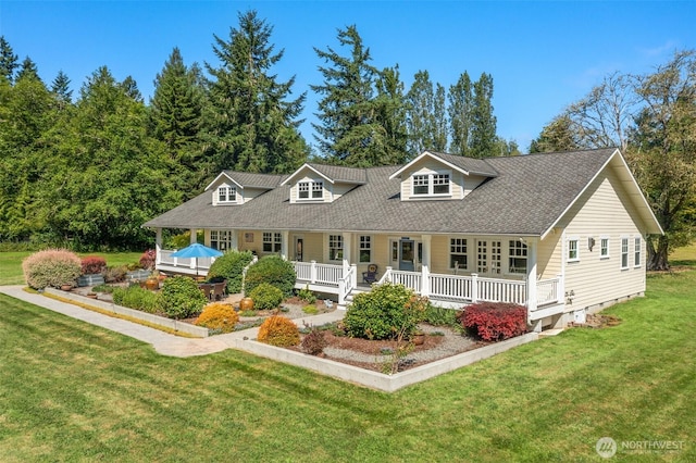 19840 Vashon Hwy SW, Vashon, WA 98070 - cape cod house featuring a front yard, a porch, and a shingled roof