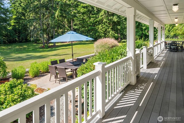 19840 Vashon Hwy SW, Vashon, WA 98070 - wooden terrace featuring outdoor dining space and a yard