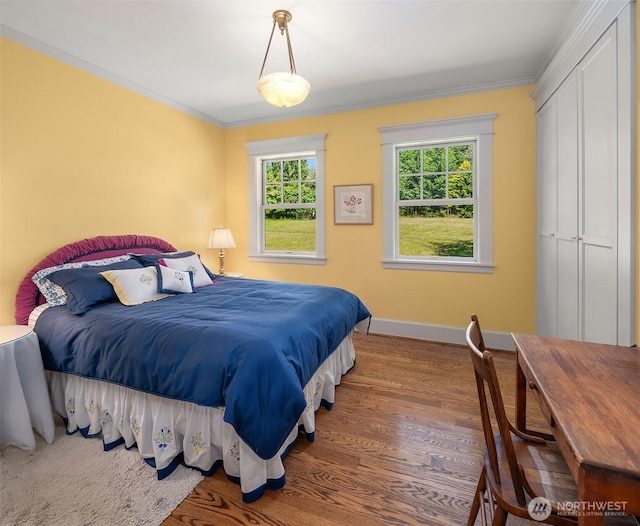 19840 Vashon Hwy SW, Vashon, WA 98070 - bedroom featuring wood finished floors and ornamental molding