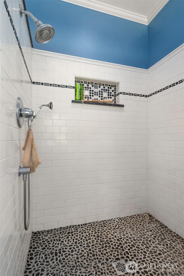 19840 Vashon Hwy SW, Vashon, WA 98070 - bathroom featuring a tile shower and ornamental molding