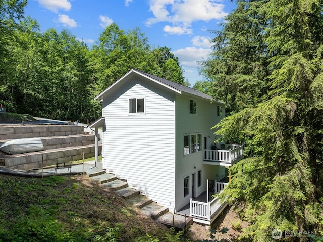 18207 Majestic Ridge Ln, Mount Vernon, WA 98274 - view of property exterior with a balcony