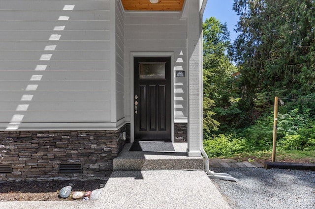 18207 Majestic Ridge Ln, Mount Vernon, WA 98274 - doorway to property with stone siding