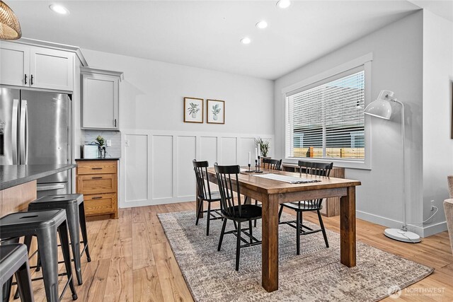 2183 Lagerwey Cir, Lynden, WA 98264 - dining area with light wood finished floors, recessed lighting, and a wainscoted wall