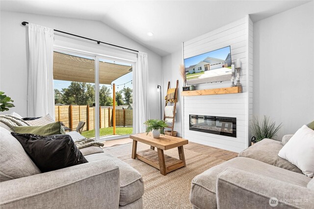2183 Lagerwey Cir, Lynden, WA 98264 - living room featuring lofted ceiling and a large fireplace