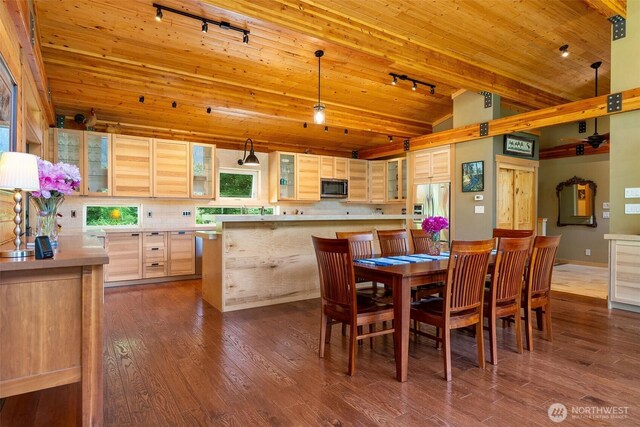 20720 501st Dr SE, Index, WA 98251 - dining area featuring track lighting, wooden ceiling, vaulted ceiling, and dark wood-style floors