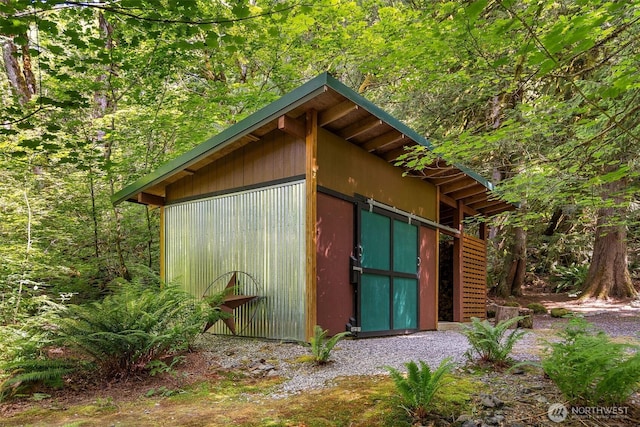 20720 501st Dr SE, Index, WA 98251 - view of outdoor structure featuring a wooded view