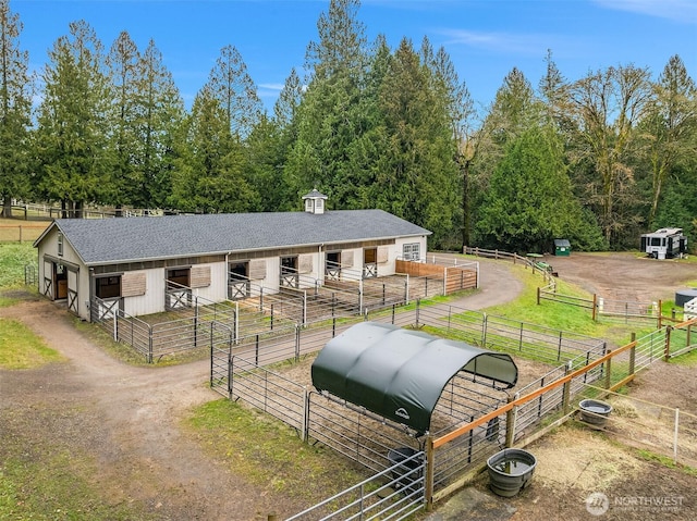 1204 SE Oak Rd, Port Orchard, WA 98367 - view of front of house featuring an exterior structure, an outbuilding, and roof with shingles