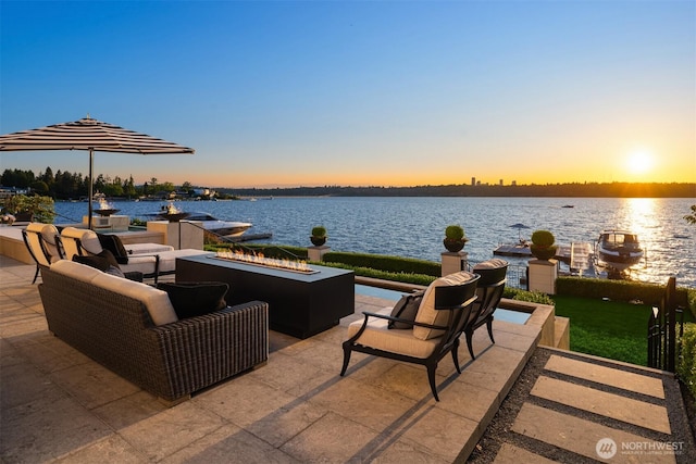 1615 Roanoke Way, Mercer Island, WA 98040 - view of patio with an outdoor fire pit and a water view