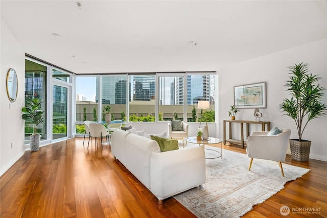 10700 NE 4th St Unit 806, Bellevue, WA 98004 - living area with wood finished floors and expansive windows